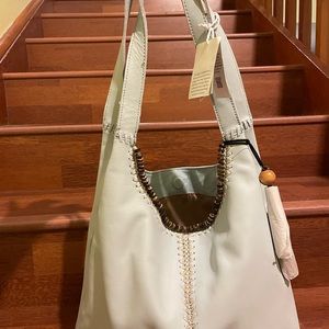 The sak brand new leather bag with tags and wrap